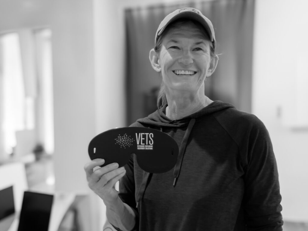 Peggy Russin, Owner-Mindfold Holding one of the first custom masks 2023