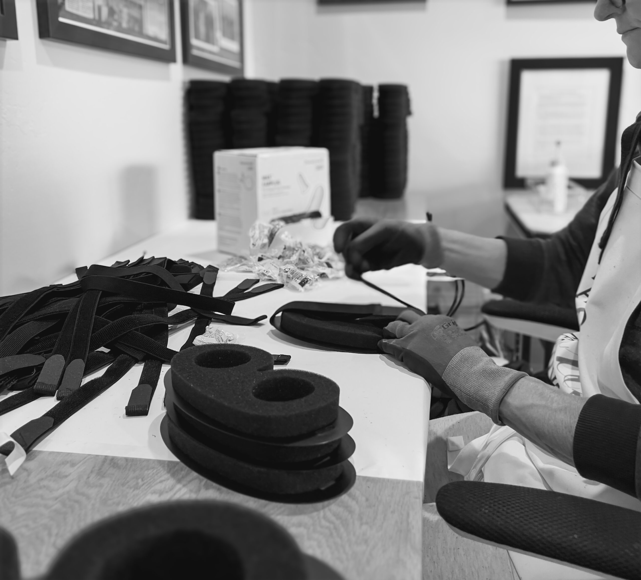 Energetic photo of Peggy strapping masks
